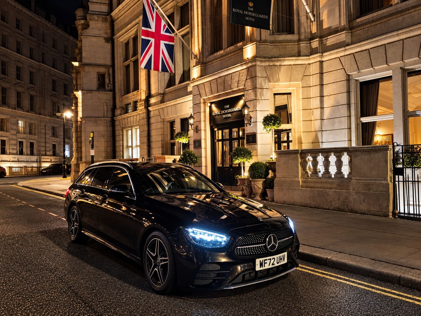 Black Mercedes executive estate outside The Royal Horseguards Hotel, London